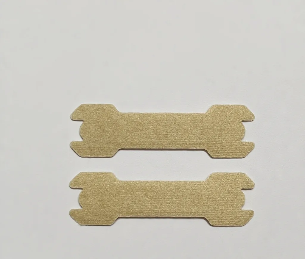 Sports nasal strips shown as a product pair in tan colour